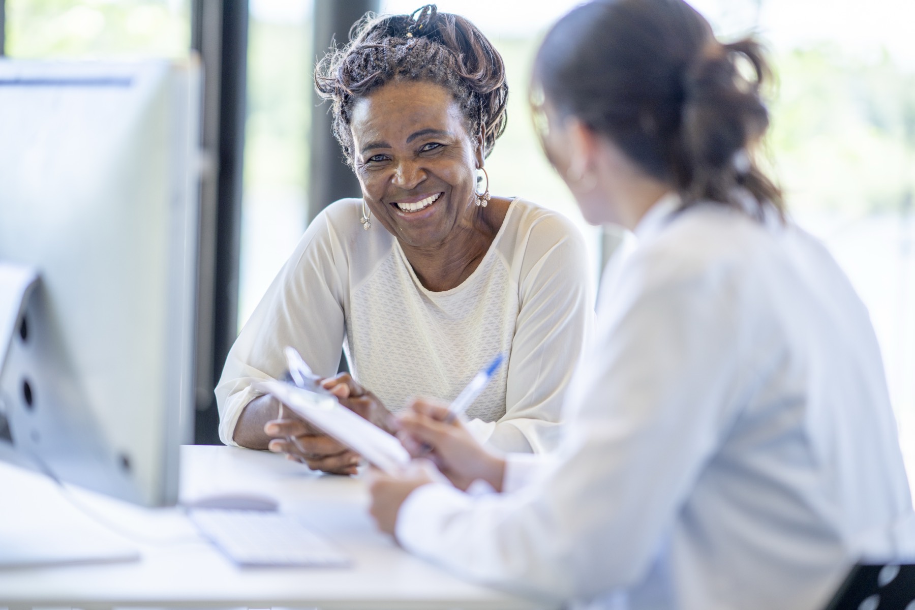 Doctor consulting with patient